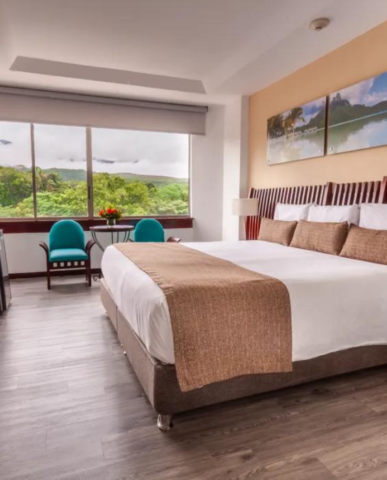 Suite Hotel Kualamaná Melgar Suite Hotel Kualamaná Melgar